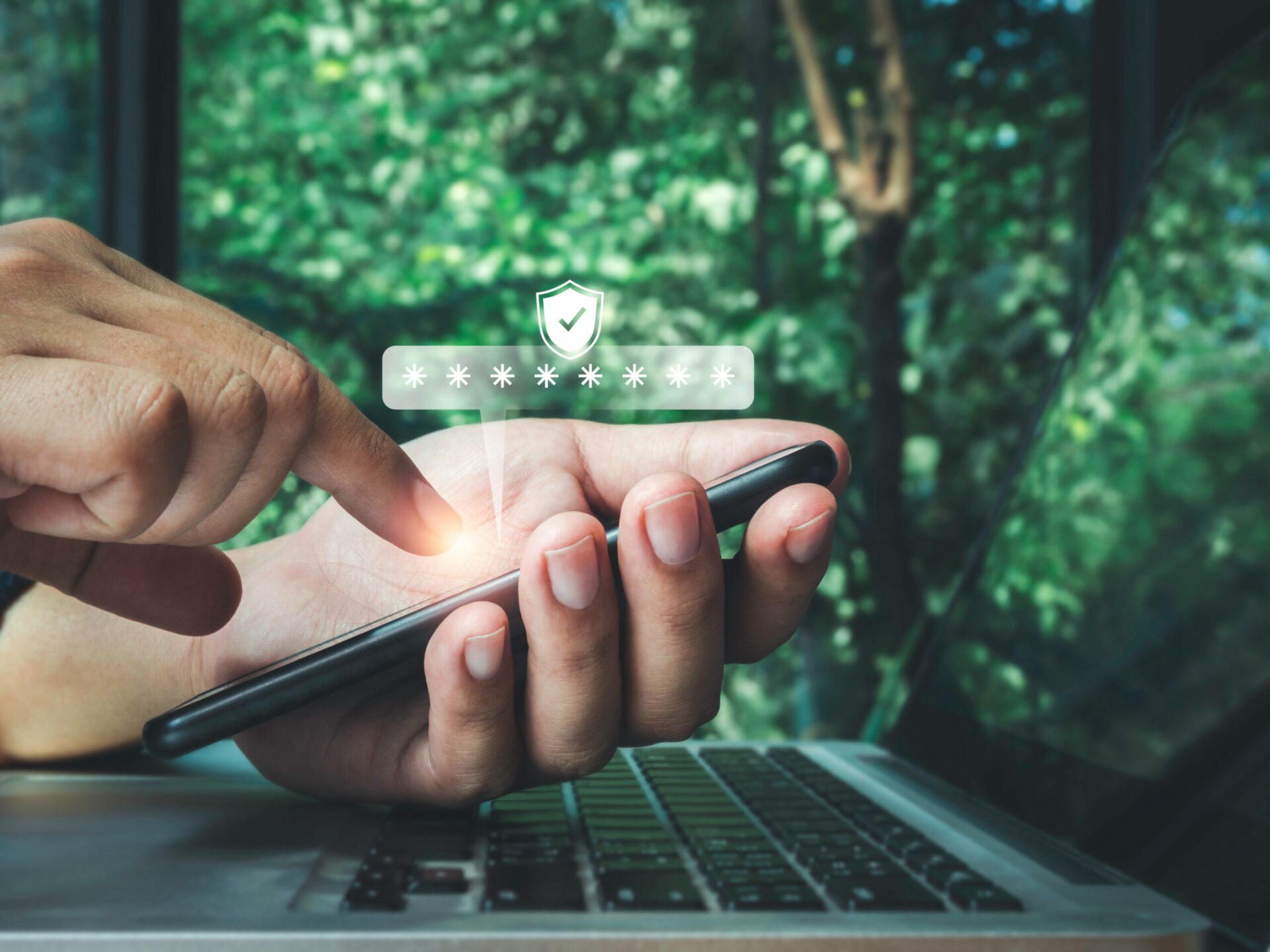 Two steps authentication concept. Virtual safety shield icon while access on phone with laptop for validate password, Identity verification, cybersecurity with biometrics authentication technology.